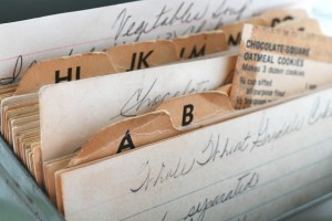 close-up of recipe box with handwritten index cards and alphabet dividers